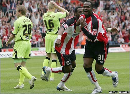 John then takes centre stage netting twice, either side of Jonathan Stead\'s strike, before getting sent off as Southampton survive.jpg